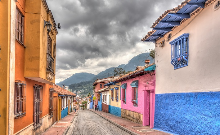 Poeple are shown walking in a street in La Candelaria district, Bogota, Colombia. Picture: 123RF