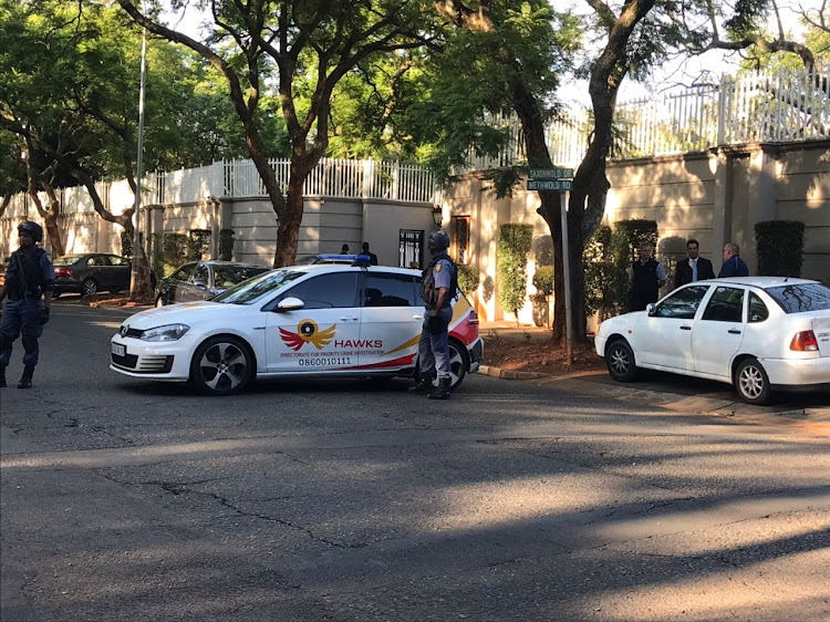 Hawks conduct a raid at the Gupta compound in Saxonwold on 14 February 2018.