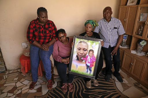 Mantombi, Dineo, Nomthandazo and Themba Rapodile are sad that the sentences of the killer of Nonhlanhla and Hlelokuhle Rapodile (in picture) will run concurrently. /Thulani Mbele