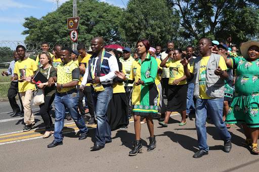 Spokesman Mdumiseni Ntuli Moutain and KZN ANC members march to the Rise police station to open a case of Crimen injuria against a DA member.