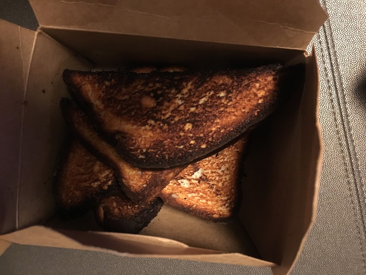 Burnt gf bread that went with artichoke dip