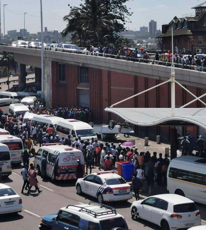 Spectators line the N3 and the Pine Street taxi rank where a falling bakkie killed at least one person on November 14 2020.