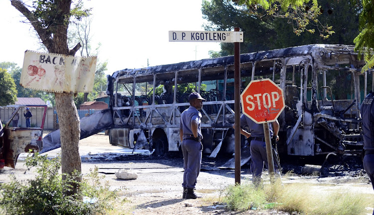 A bus was torched during Mahikeng protest.