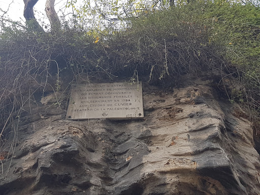 This plaque sits well above any viewer's head on a stone wall right near a staircase that leads up to the famous Sacré Coeur in Montmartre. It reads: "Ici était l'entrée des carrières de...