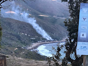Smoke rises from Tintswalo Atlantic, in Hout Bay, early on February 5 2019.
