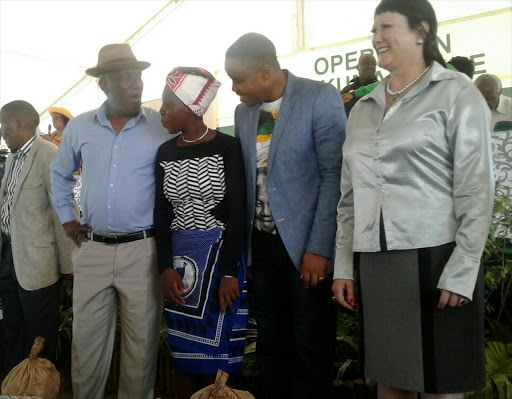 Bheki Cele, Mthandeni Dlungwane and Belinda Scott hand out food parcels to needy families of Ward 32 in Pietermaritzburg on Tuesday.