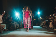 Actor and founder of Essie Apparel Enhle Mbali Mlotshwa in the final runway walk of her show at Apartheid Museum in Johannesburg