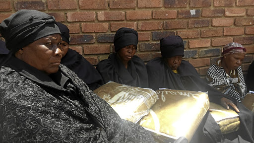 Some of the widows who attended the Widows Forum at the Kabokweni Community Hall in Mpumalanga in 2014 for the discussion of challenges they face, are attired in mourning clothes that should be removed in winter. /Sibongile Mashaba