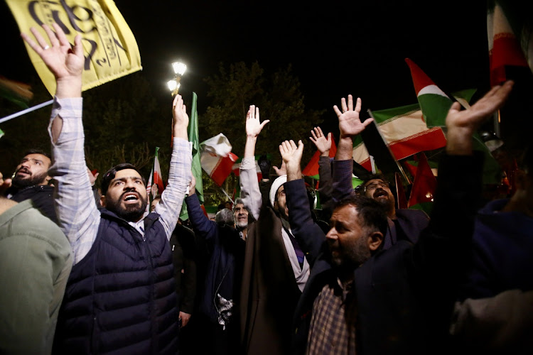 People holding Iranian flags gather to stage a demonstration in support of Iran's attack on Israel in Tehran, Iran, April 14 2024. Picture: Fatemeh Bahrami/Anadolu via Getty Images