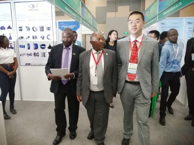 From left is Patrick Nyangweso · Chief Operating Officer at Kenya National Chamber of Commerce & Industry, Pius Rotich- Manger, Marketing at Kenya Investment Authority. Kenya Investment Authority and Gao Wei- Managing Director, Afripeak Expo Kenya Limited.