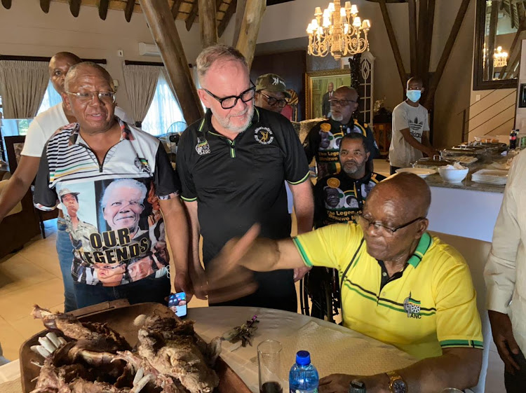 Former president Jacob Zuma with members of the MKMVA at his Nkandla homestead. Among the recent visitors were MKMVA president Kebby Maphatsoe, left, and spokesperson Carl Niehaus. File photo