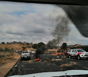 Protesters blocked the entrance and exit to Copesville on Monday.