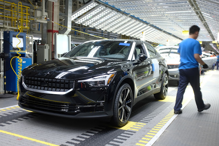 Workers are seen on a production line for Polestar, Volvo and Lynk&Co vehicles at a Geely plant in Taizhou, Zhejiang province, China, on July 29, 2020. Picture taken July 29, 2020. Picture: REUTERS/YILEI SUN/FILE