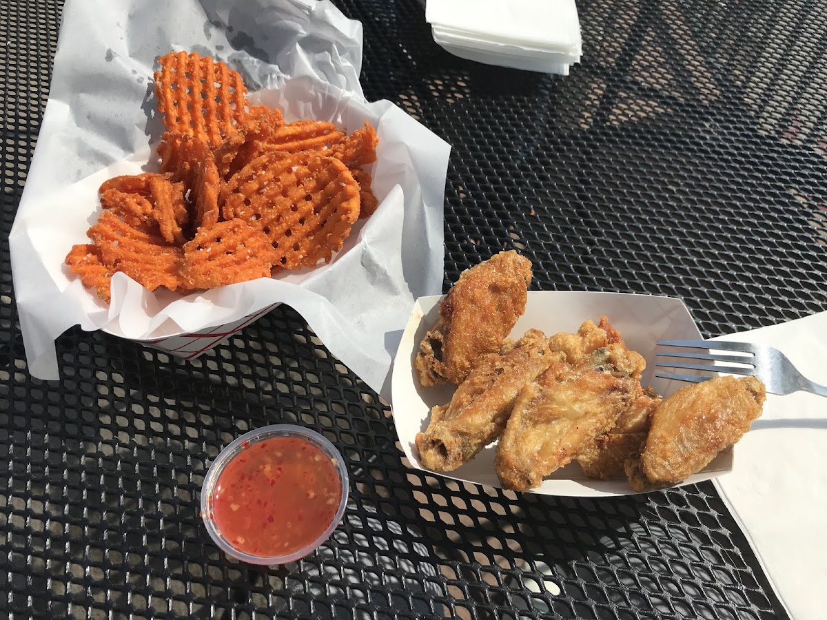 Traditional wings with sweet potato fries and their sweet n sour sauce.