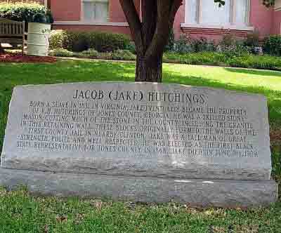 Born a slave in 1831 in Virginia, Jake eventually became the property of R.H. Hutchings of Jones County, Georgia. He was a skilled stone mason, cutting much of the stone in the county, including...