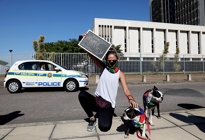 Charlene Wannenburg,33, outside the Durban magistrate's court during protest action against government's continued ban on the sale of tobacco and related products.