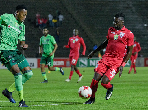 Mohammed Anas of Free State Stars and Happy Jele of Orlando Pirates during the Nedbank Cup Last 16 match between Free State Stars and Orlando Pirates at James Motlatsi Stadium on April 08, 2017 in Orkney, South Africa.