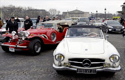 German Mercedes cars seen on the place de la concorde during the 14th edition of the 