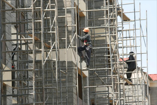 Construction workers at work. Jack Owuor