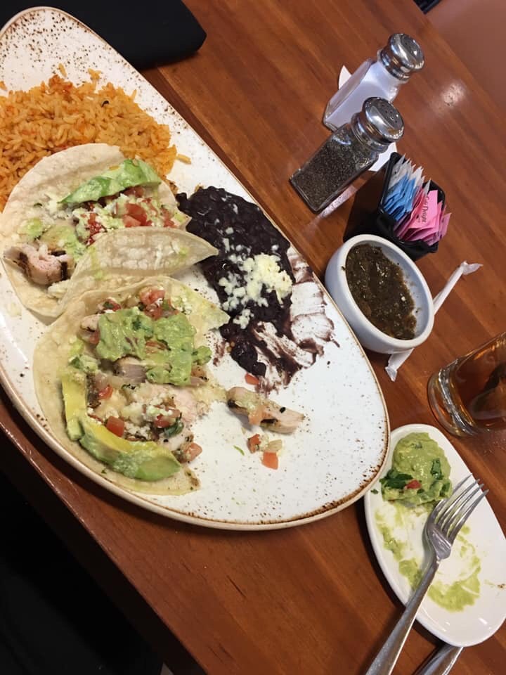 Very tasty and a huge portion. 3 soft shell chicken and avocado tacos, amazing black beans and rice. I ordered guacamole on the side. Enough food for 2! I’m very sensitive to gluten and did not react