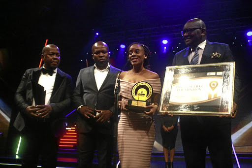 Overall winner of the Gauteng Township Entrepreneur Awards Nokubonga Dlamini is presented with the award at the event at Carnival City on Saturday night. Everyone who was nominated went home with R20000. / KABELO MOKOENA