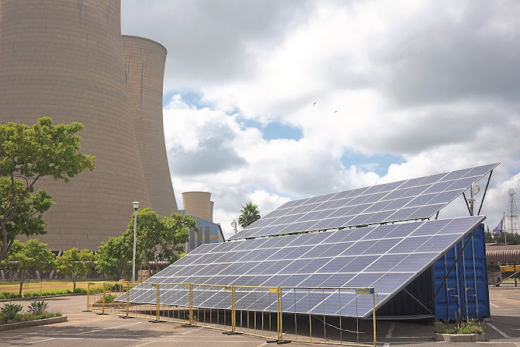 Solar panels are shown as part of a solar energy project at the Komati power plant in Mpumalanga. Picture: JAN BORMAN