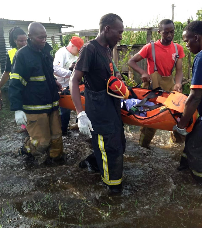 Compassionate Centre for Families (CCF) and Kisumu county fire department team rescue an 80-year-old man, Wilson Adaa Sangala, who was stranded in his marooned house after he fall sick on Sunday.