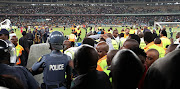 Fans vandalizing the stadium during the 2018 Nedbank Cup match between Kaizer Chiefs and Free State Stars at Moses Mabhida Stadium, Durban on 21 April 2018.