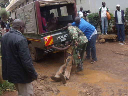 Police during an operation on illicit alcohol in Eldoret. /FILE