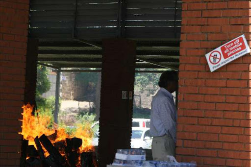Cheaper: A cremation in progress in a crematorium at Kariokor, Nairobi. The county government has increased the cost of burying the dead and reduced the cost of cremation