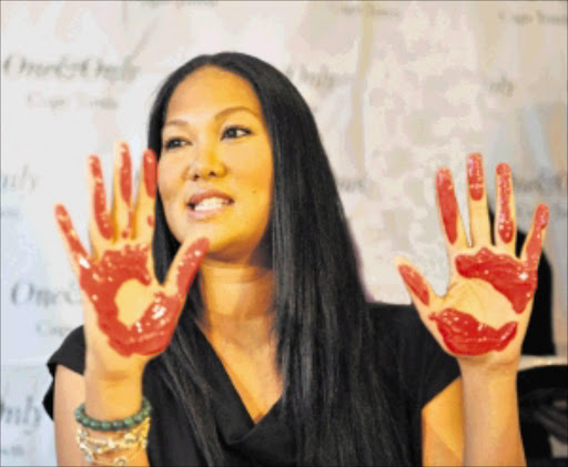 Kimora Lee Simmons lends a hand for the Mandela Foundation Picture: BRUCE SUTHERLAND