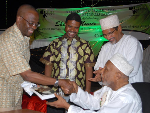 Chief Justice Willy Mutunga, Haki Africa executive director Hussein Khalid, Muslim for Human Rights chairman Khelef Khalifa and Sheikh Sheikh Munir Mazrui