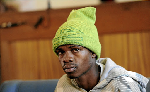 Pogiso Daniel Madiboa, who is accused of the rape and murder of an elderly woman in Coligny, North West, appeared in court yesterday. / Veli Nhlapo