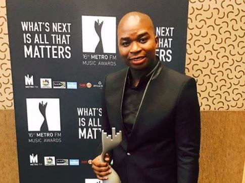DR Tumi wasn't impressed when a troll said he's trying to hard to be 'American'.
