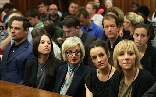 Pistorius family show a united front before the start of Oscar Pistorius' murder trial.