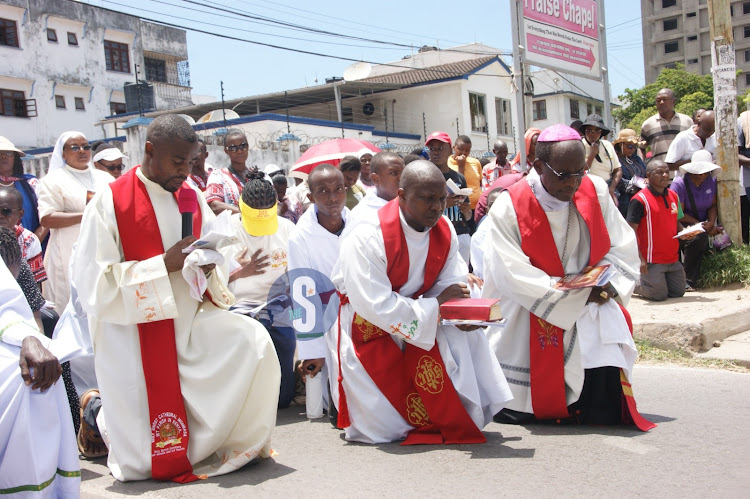 Mombasa Archdiocese Bishop Martin Kivuva leads Catholics in the procession along Nyerere Road to mark the crucifixion of Jesus Christ on March 29, 2024.