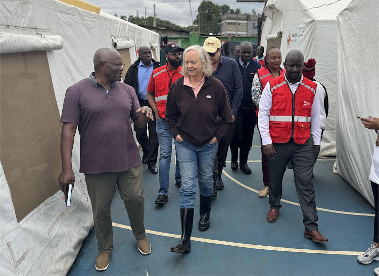 US Ambassador to Kenya Meg Whitman accompanied by Kenya Red Cross officials tour an evacuation camp in Mathare A4 hosting 252 families affected by floods, May 9, 2024.