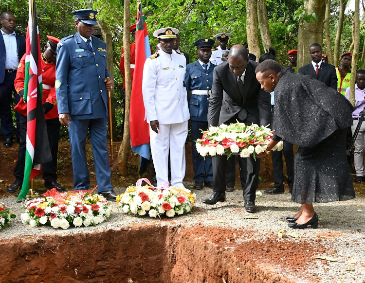 President William Ruto and First Lady Mama Rachel Ruto laying a wreath during the burial ceremony of CDF General Francis Ogolla at his home at Ngiya Village in Siaya County on April 21, 2024.