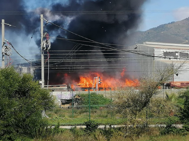 Train carriages went up in flames at an engineering yard in Cape Town on Sunday.