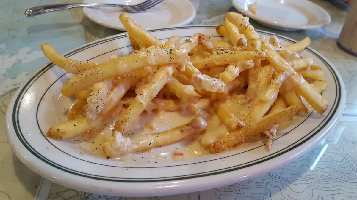 cheesy crab pepper soup smothered fries..yumm!