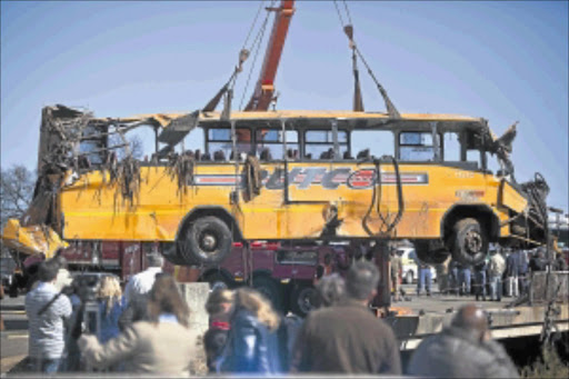 DEATHTRAP: The wreckage of a Putco bus that crashed near Meyerton being recovered from the Klip River. Nineteen people were killed and 54 injured. PHOTO: HALDEN KROG