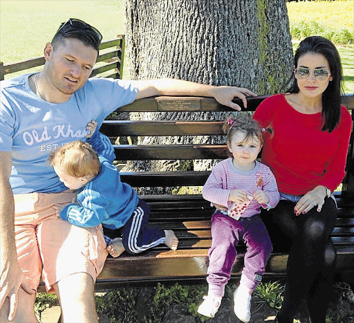 This picture from the Instagram account of Morgan Deane shows her with cricketer husband Graeme Smith and their children, Carter, 1, and Cadence, 2