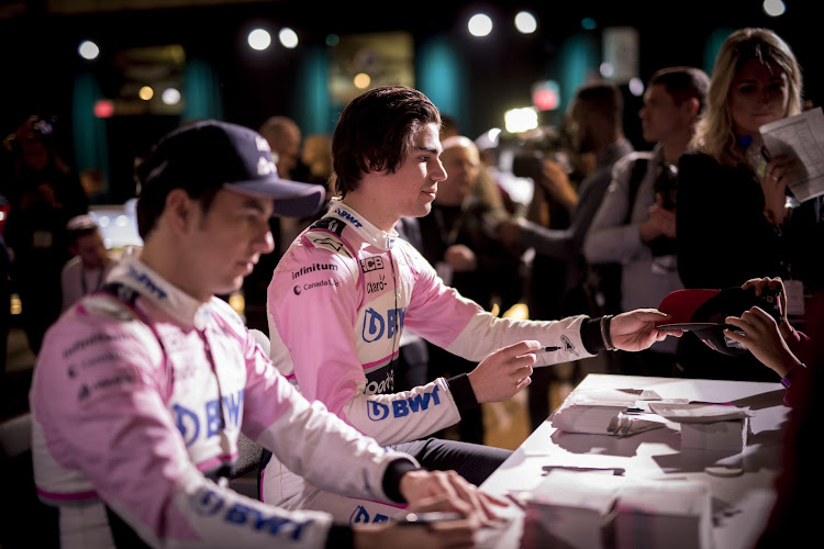 Racing Point's team principal, Otmar Szafnauer, said drivers Sergio Perez and Lance Stroll (pictured) will be on the podium at least once drinking the champagne this season.