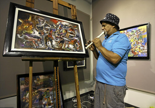 Tyrone Appollis says he sells his paintings so that he can play music and write.