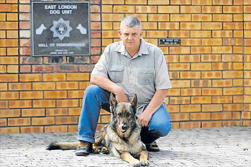 SEPTEMBER 30, 2016 East London police dog handler Warrant Officer Steve Leslie poses with Buti after an interview with the Dispatch. Leslie layed down the badge after 42 years, eight months and 15 days in the service. PICTURE ALAN EASON ©DAILY DISPATCH