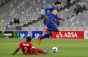 Roland Putsche of Cape Town City FC gets away from a challenge by Richard Boateng of SuperSport United during the Absa Premiership match at Cape Town Stadium, Cape Town on 14 April 2018. The match ended goalless. 