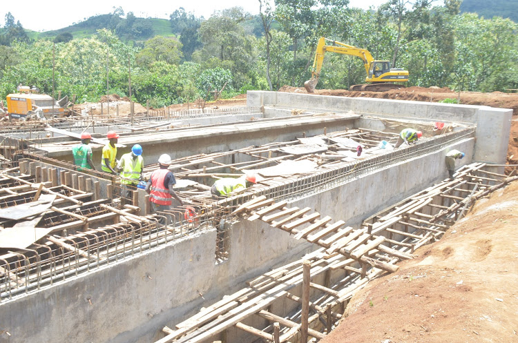 Murang’a county Development Implementation Committee at Gatango water project in Mathioya on Wednesday.