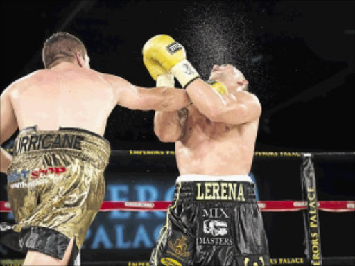 Take that! Johnny Muller gets the better of Kevin Lerena during their non-title fight at Emperors Palace on Saturday night PHOTO: n-squared