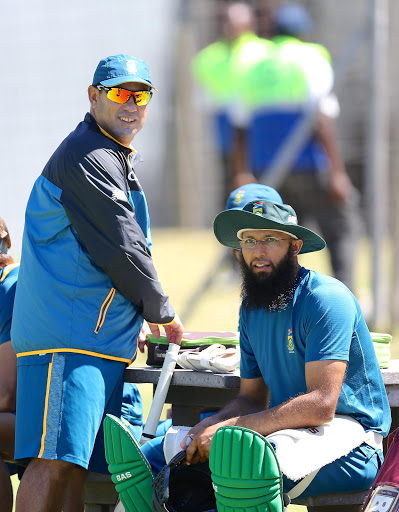 Russell Domingo and Hashim Amla during the Proteas training session and press conference at St Georges Park on February 05, 2016 in Port Elizabeth, South Africa.