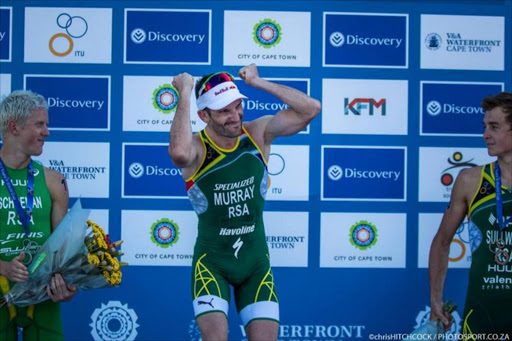 Winner Richard Murray, runner-up Henri Schoeman and Wian Sullwald on the all-SA podium at the season-opening of the Discovery Triathlon World Cup in Cape Town.
